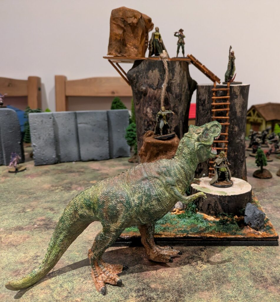 A Trex is facing a group of elves standing on a wooden structure